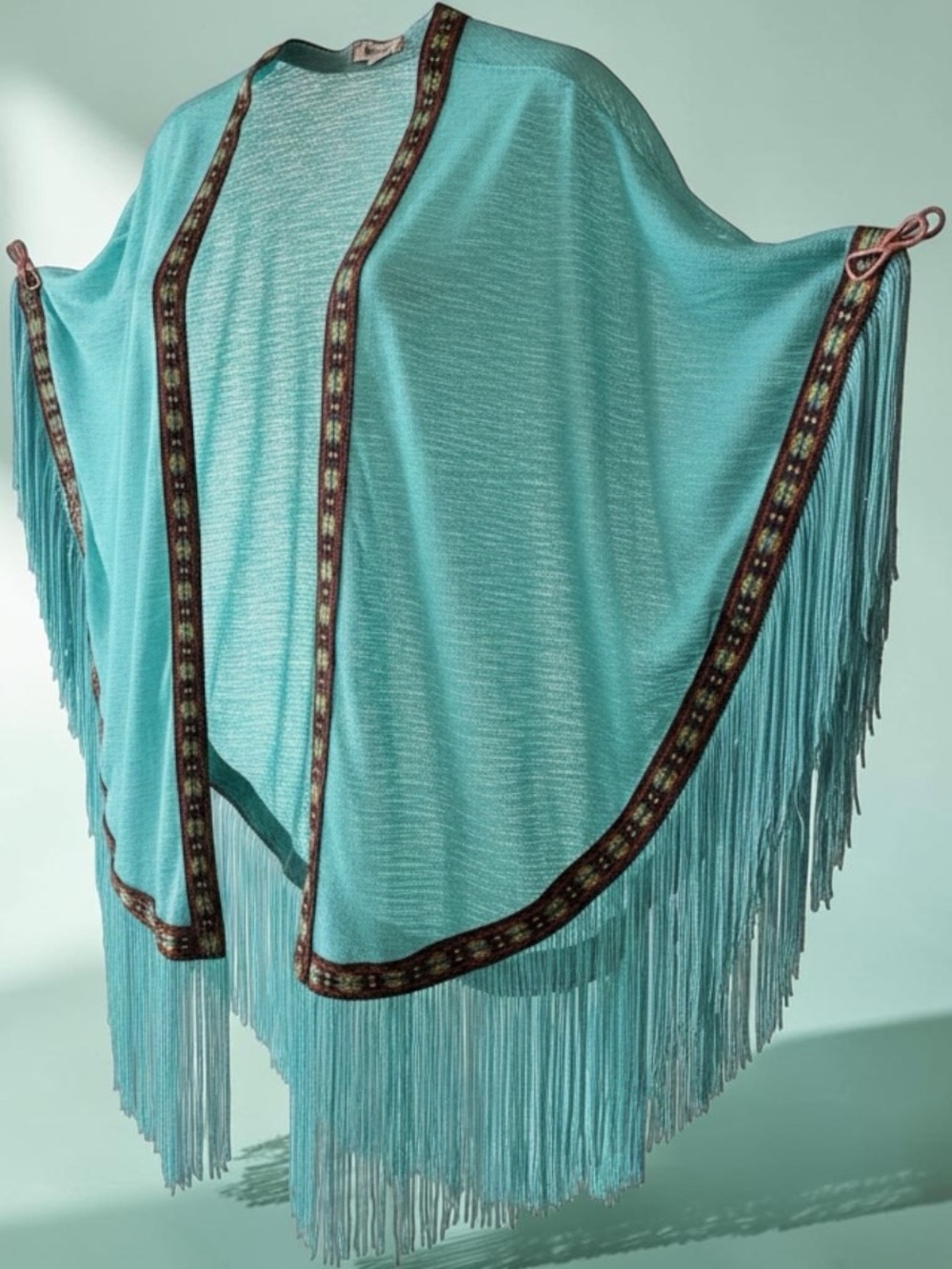 ‘Janice’ Turquoise Fringe Kimono with beautiful accented trim.one size